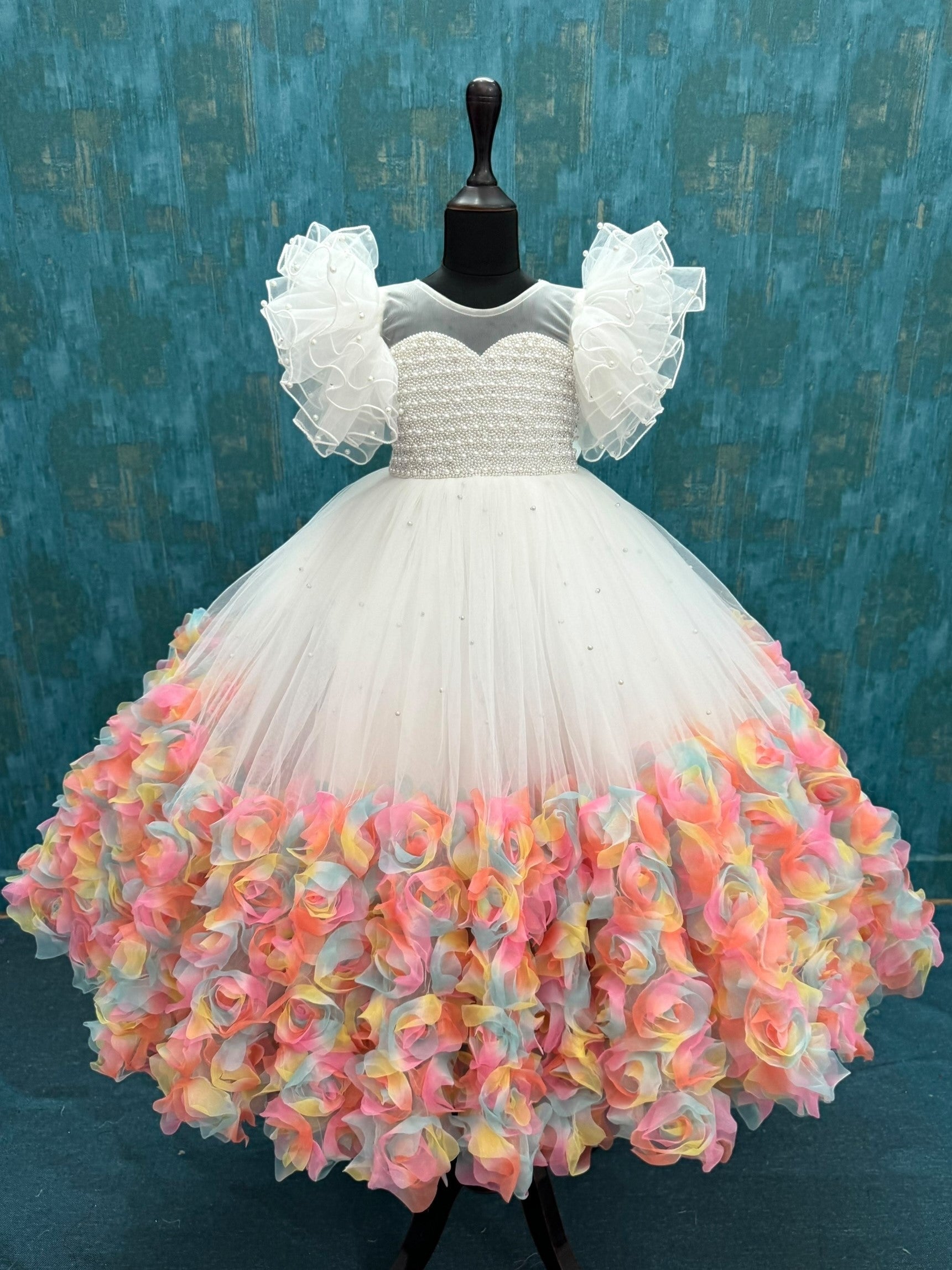 white Enchanted Rosalina Garden gown with pearl work top