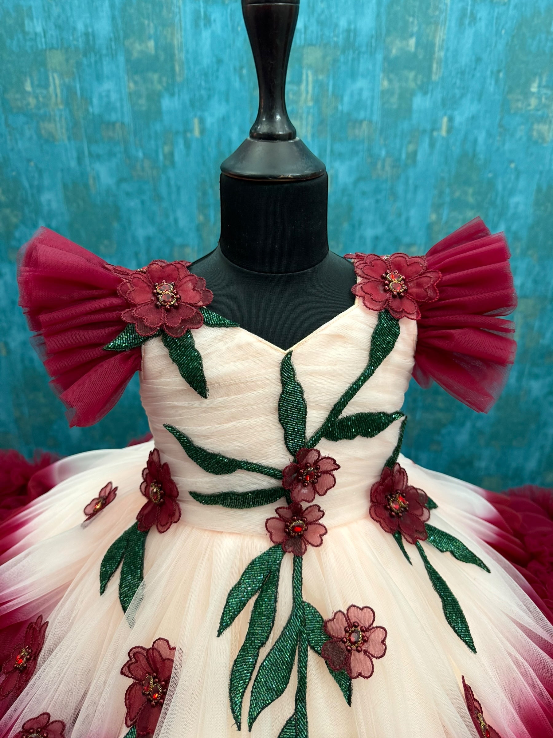 Peach And Maroon double shade couture gown with hand crafted flowers and leaves