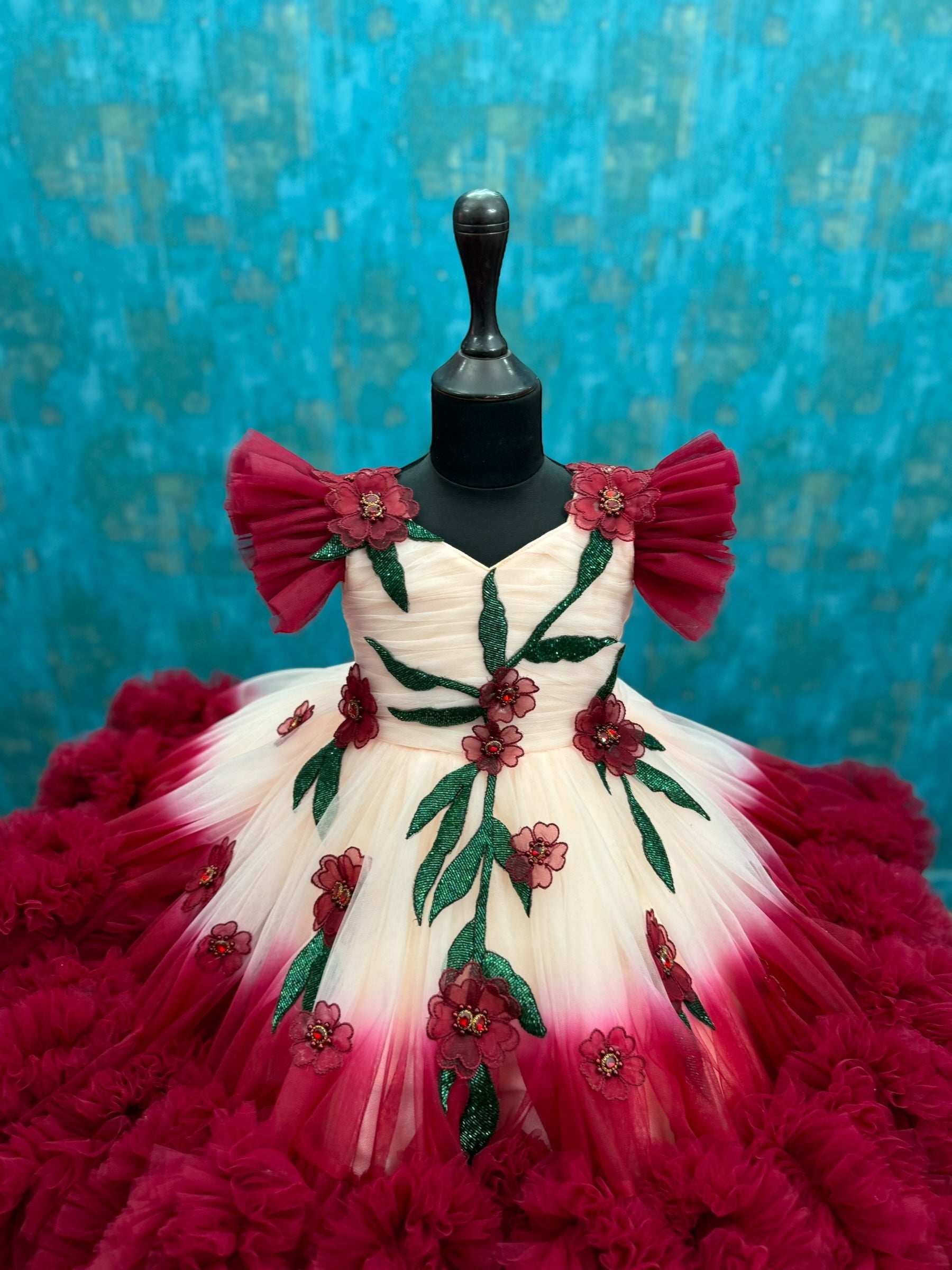 Peach And Maroon double shade couture gown with hand crafted flowers and leaves