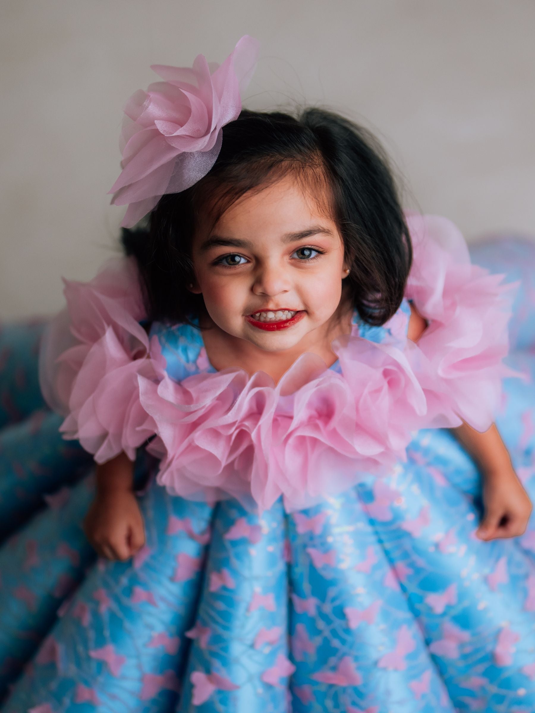 BUTTERFLY AND 3D FLORAL STRUCTURED PANEL BALL GOWN