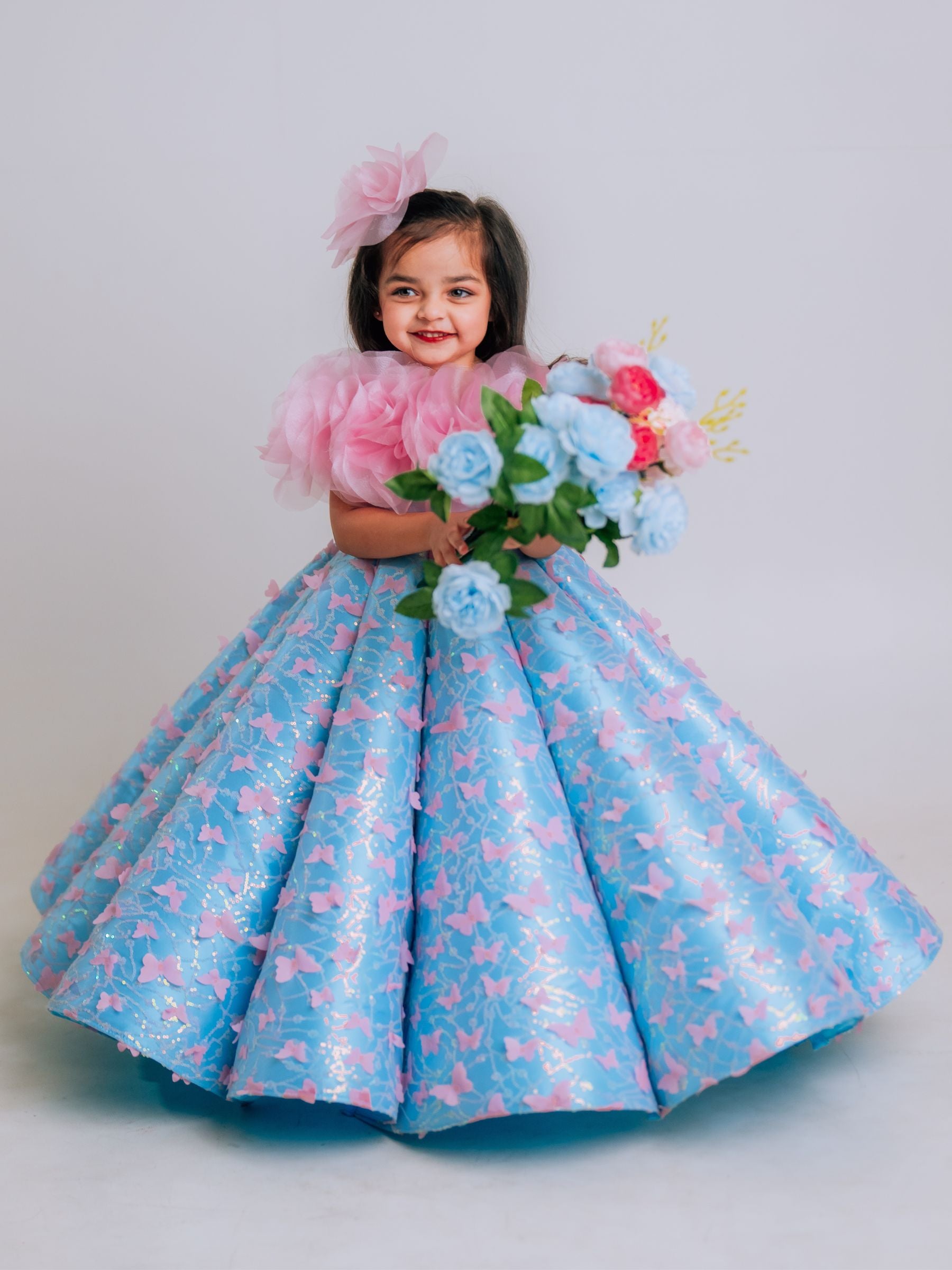 BUTTERFLY AND 3D FLORAL STRUCTURED PANEL BALL GOWN