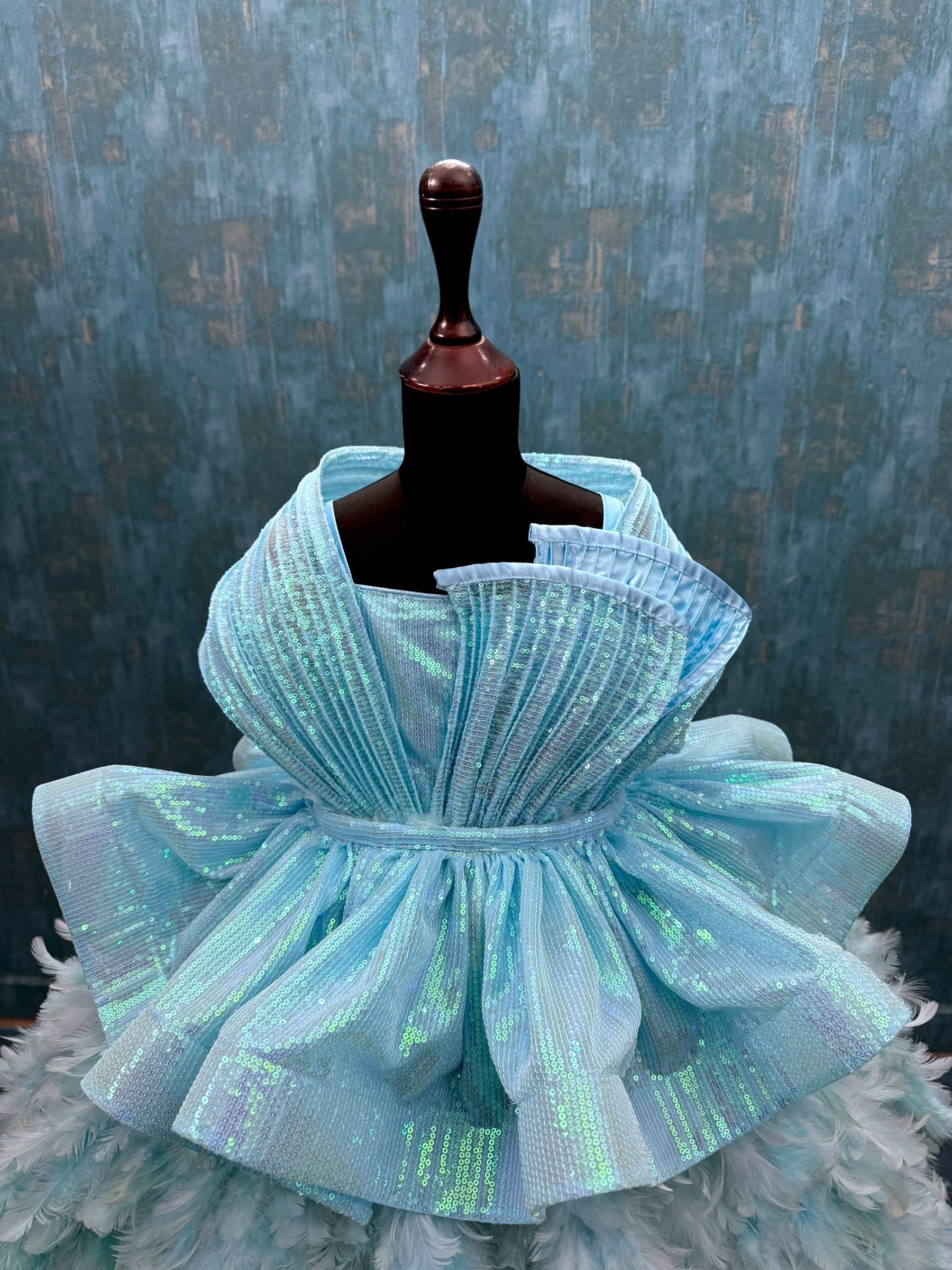 Turquoise feather structure ball with detachable sequin skirt