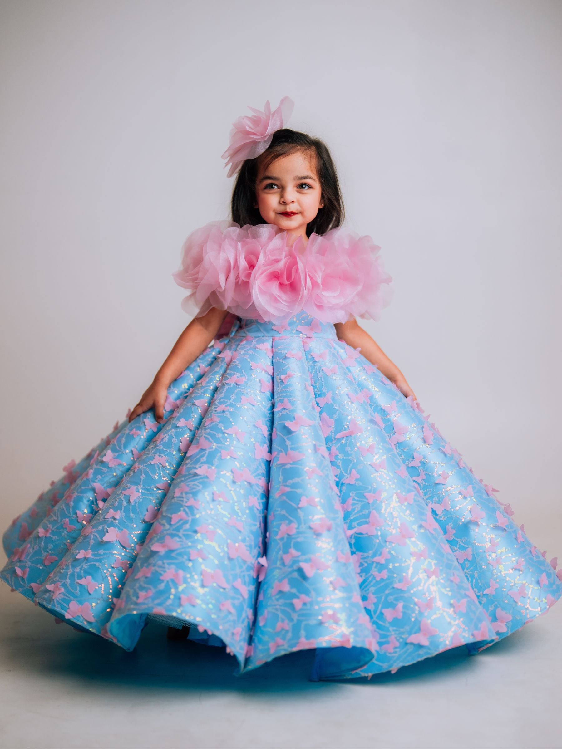 BUTTERFLY AND 3D FLORAL STRUCTURED PANEL BALL GOWN