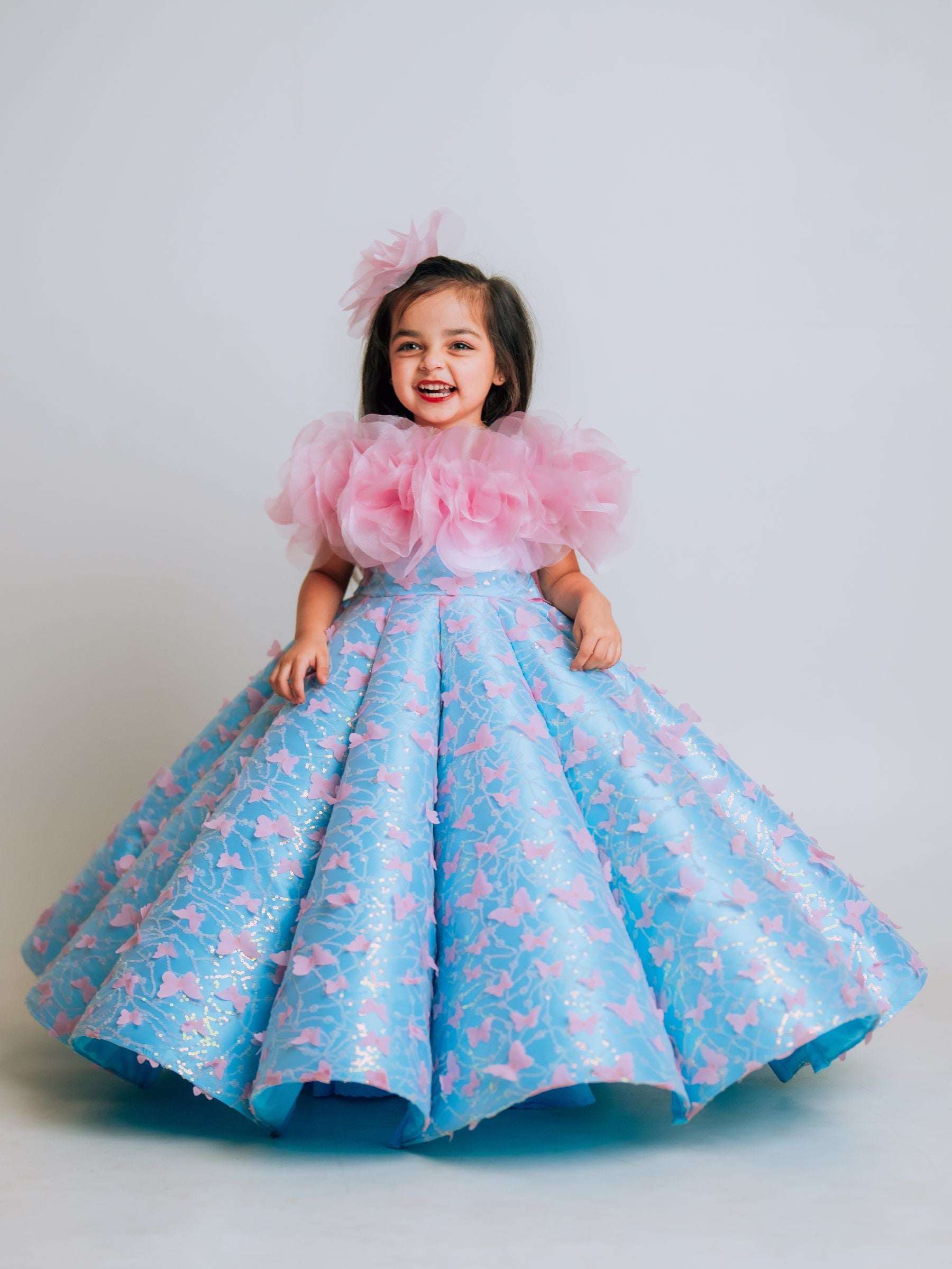 BUTTERFLY AND 3D FLORAL STRUCTURED PANEL BALL GOWN