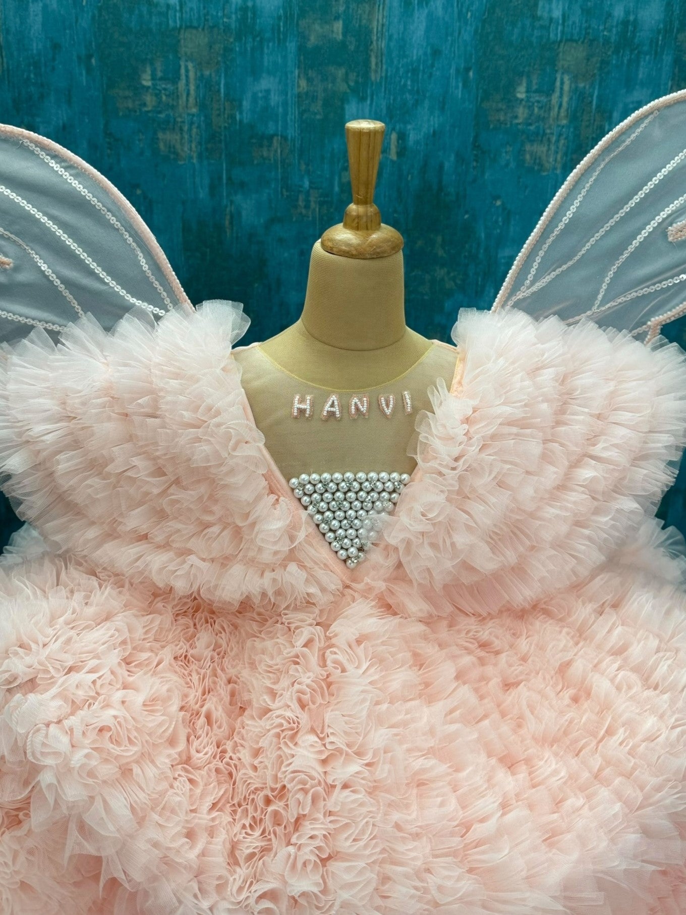 Peach Layer Ruffle Ball Gown With Hand Crafted Wings