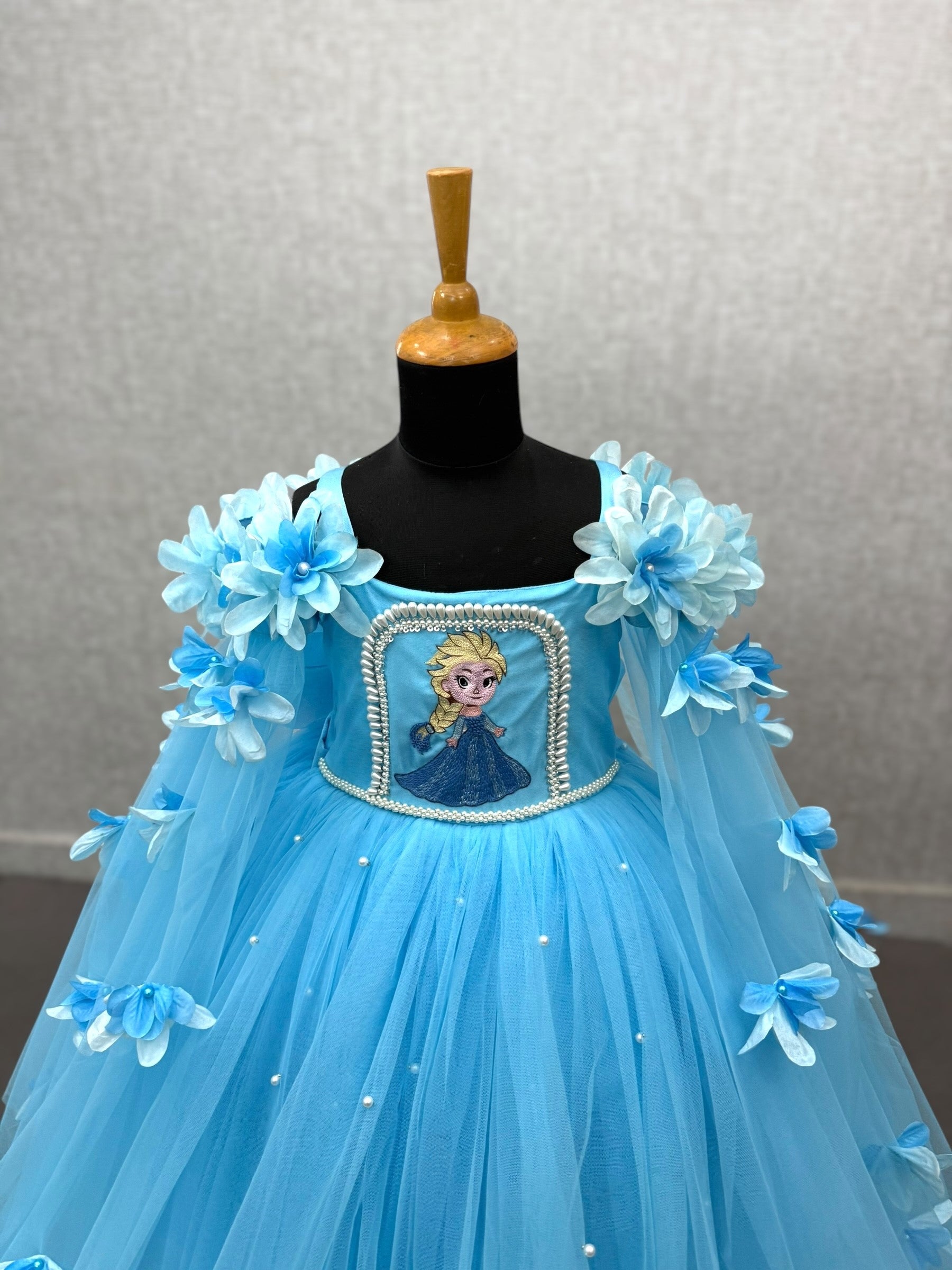 blue frozen elsa bloom gown with floral work