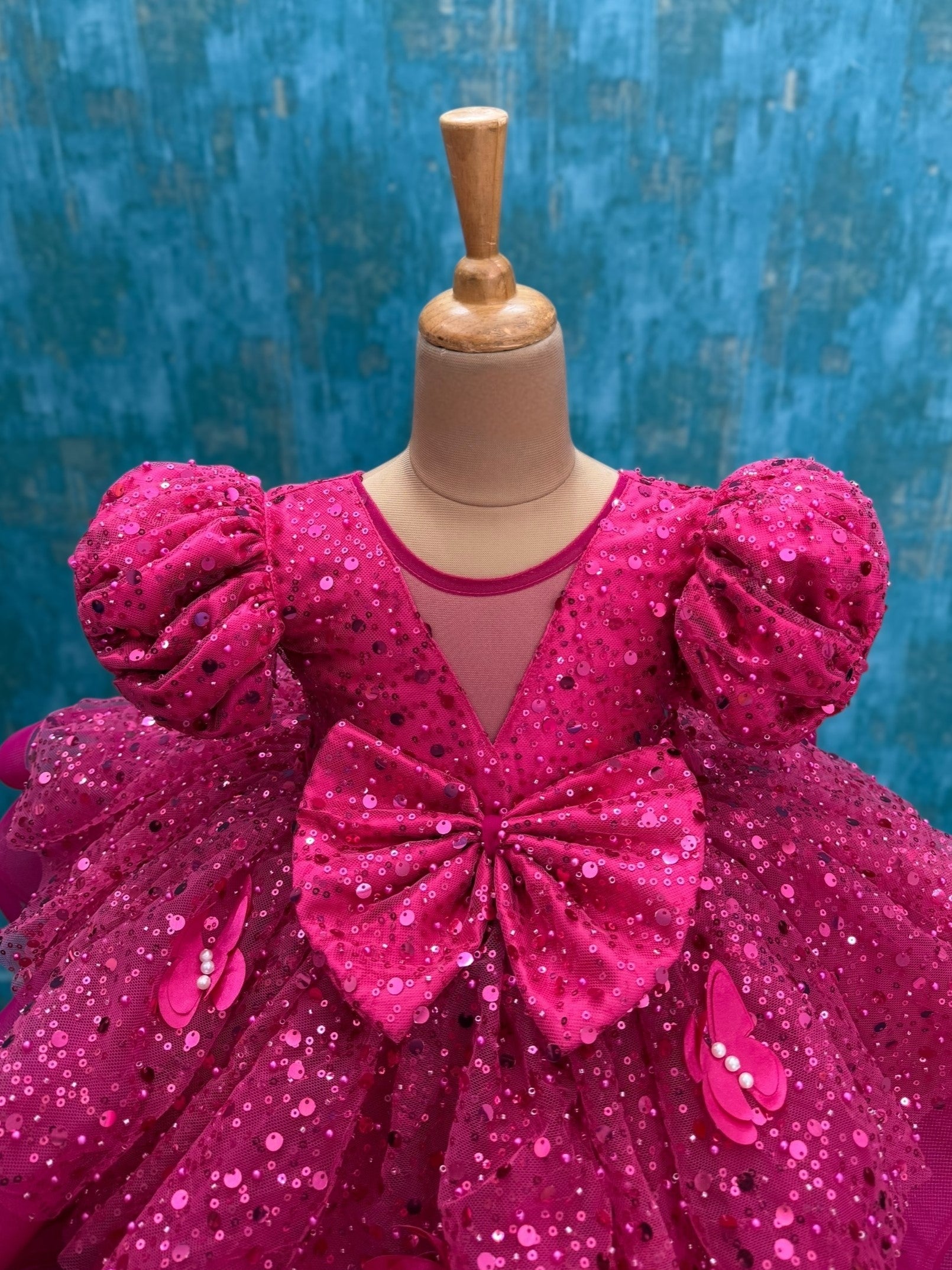 pink sequence layer gown with puff sleeves