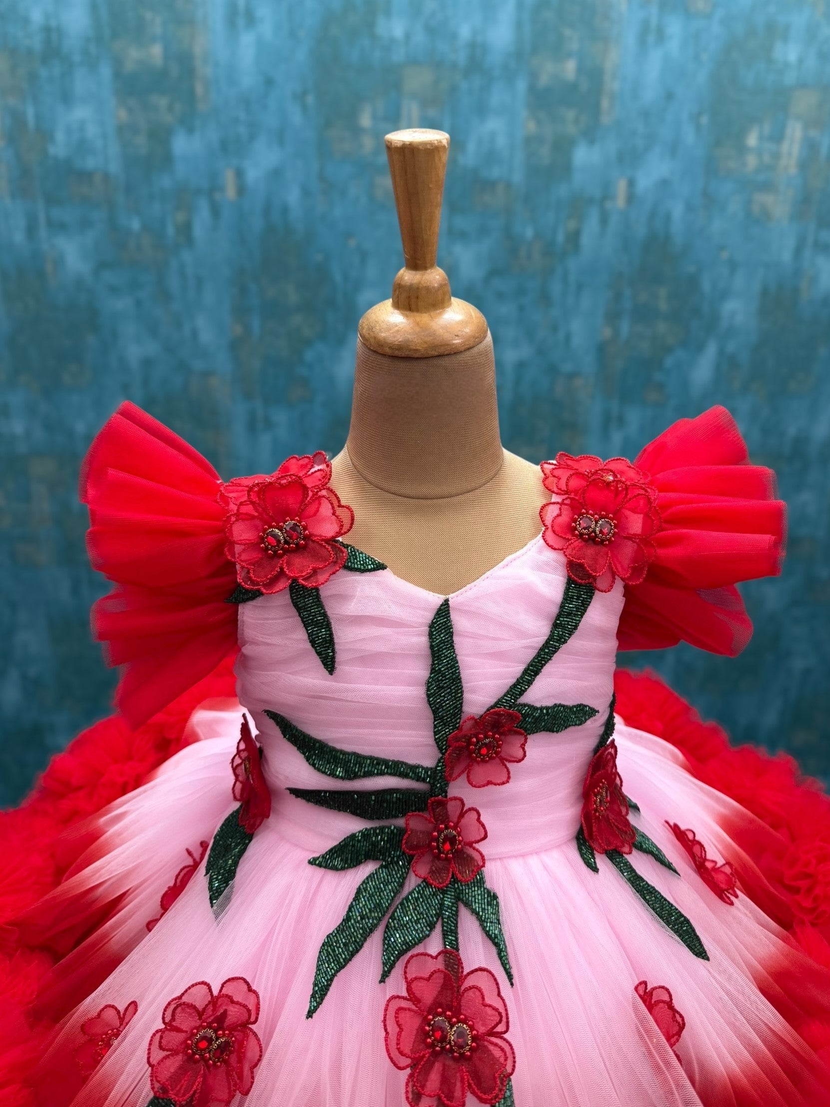 Peach And red double shade couture gown with hand crafted flowers and leaves