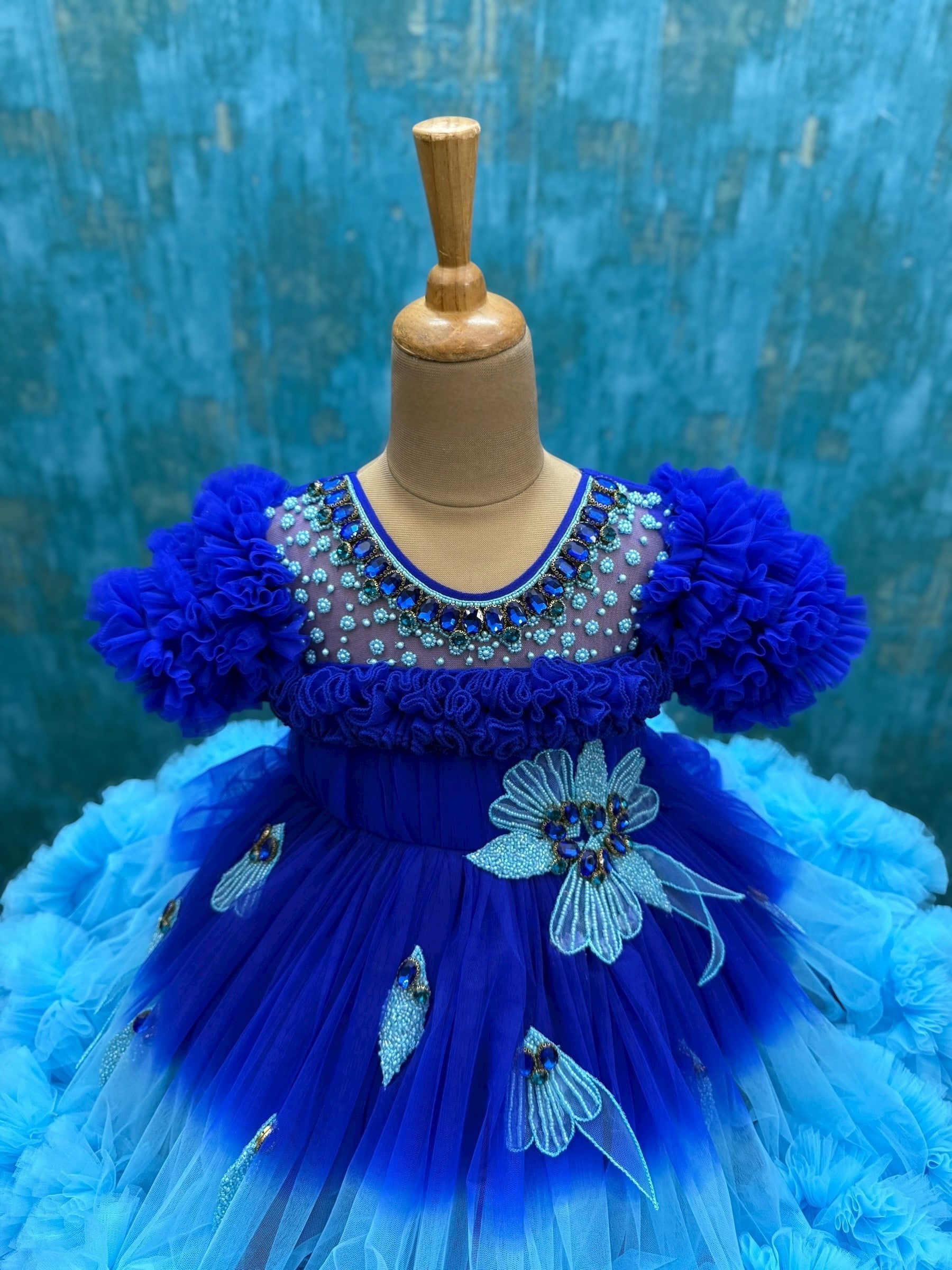 blue ombre shaded couture gown with hand crafted flowers