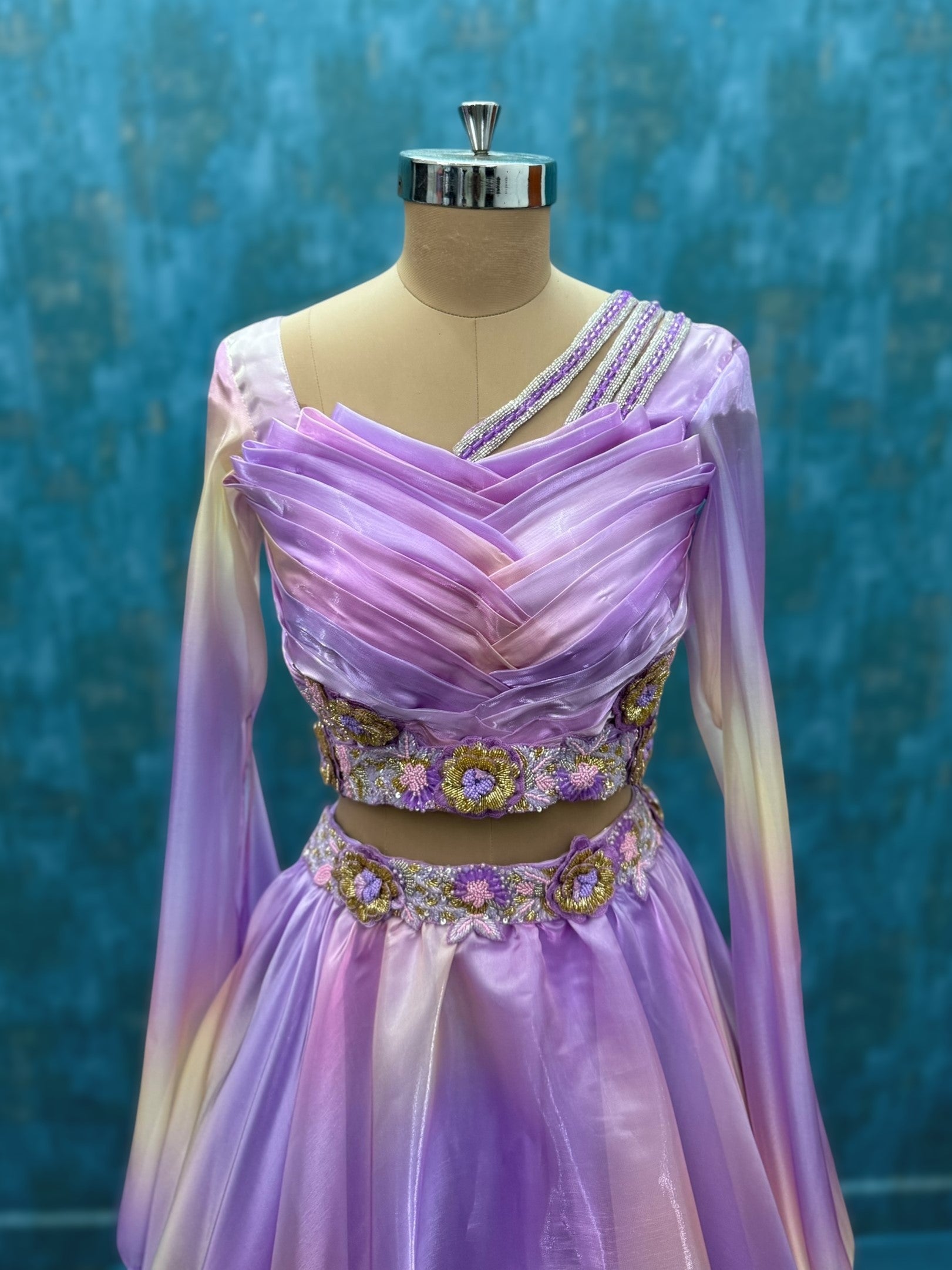 Draped hand embroidered lehenga with flowing sleeves