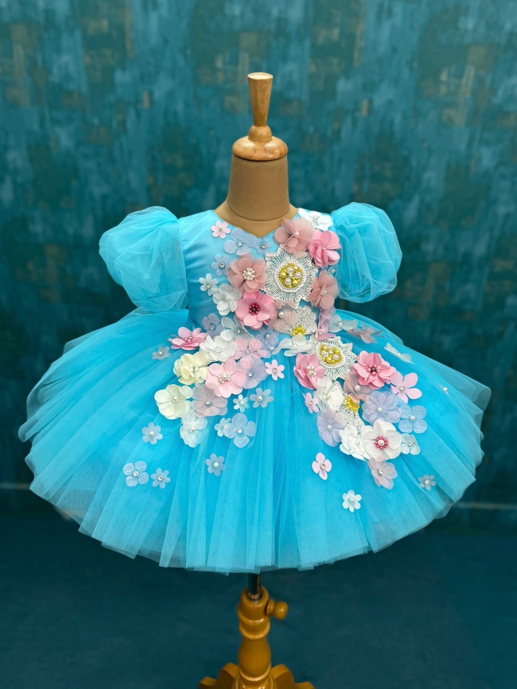 Blue floral and butterfly ball gown with intricate work
