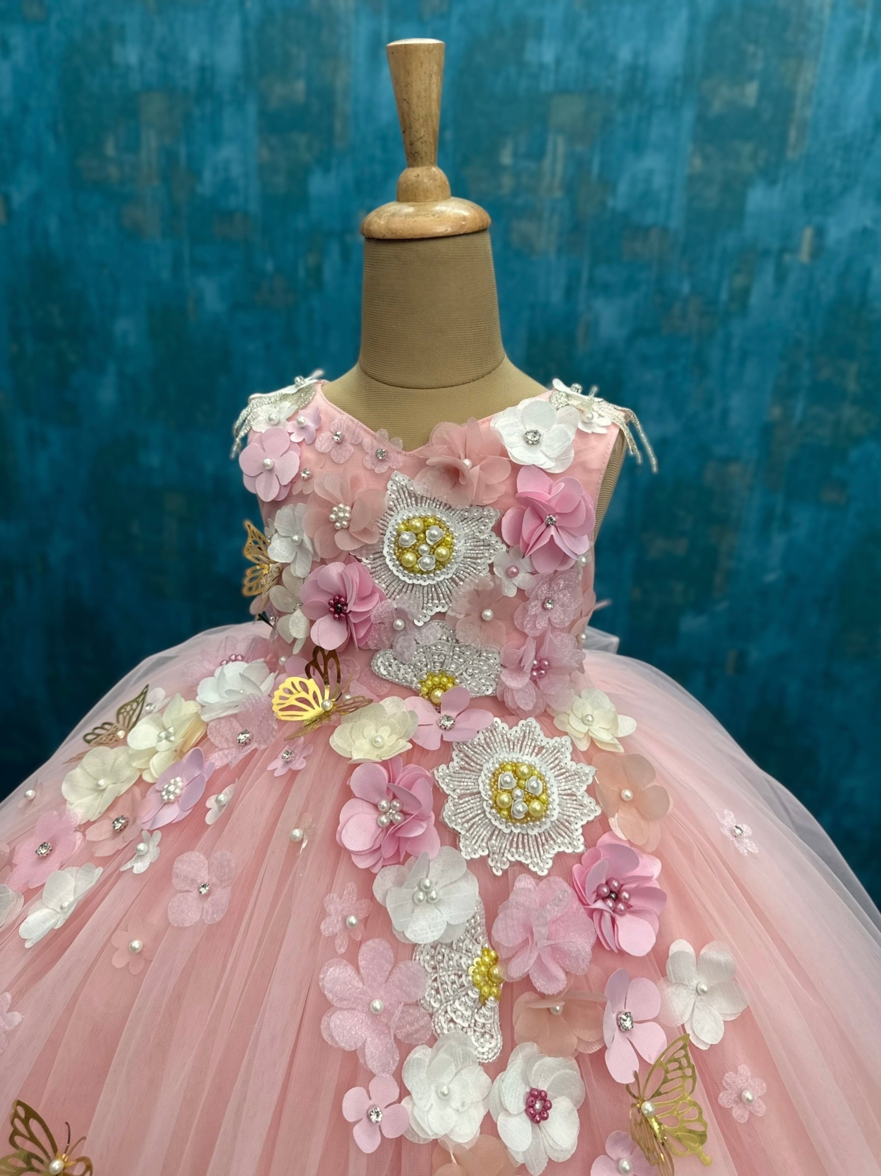 Soft Rose Pink floral and butterfly sleeveless ball gown with intricate work