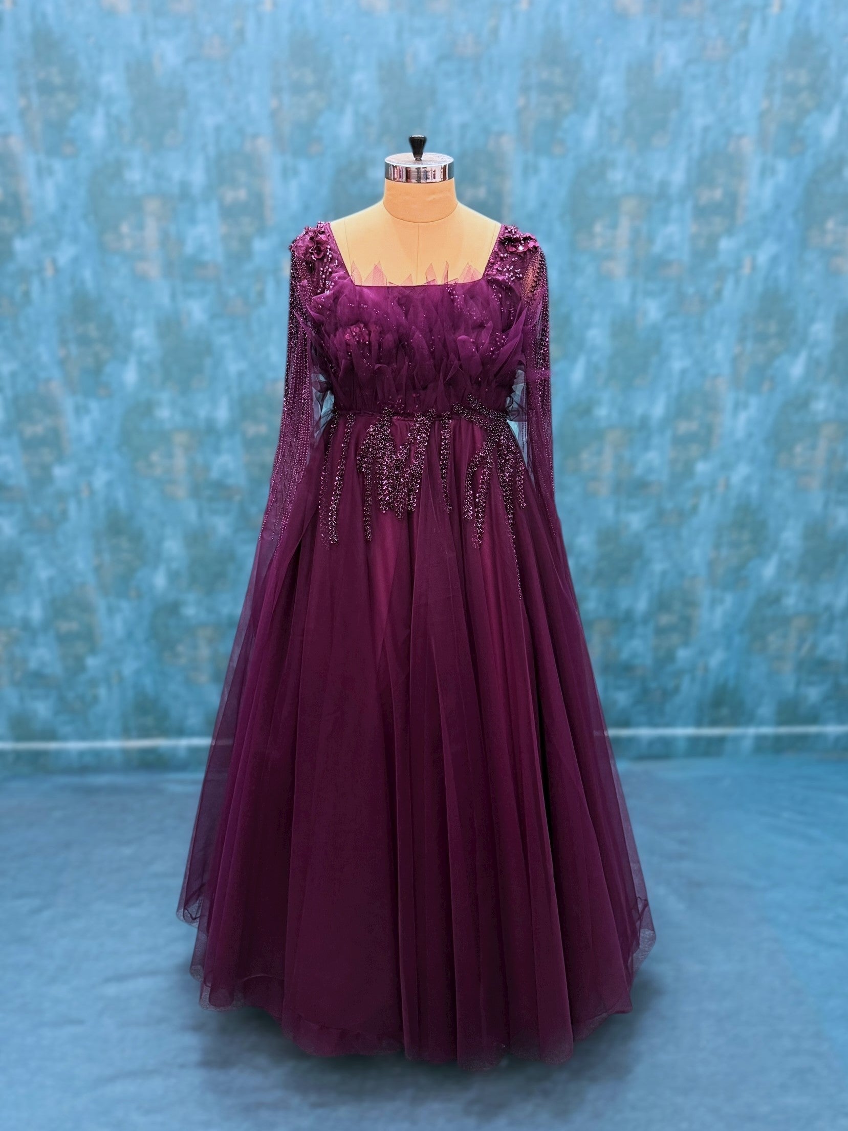 Wine hand embroidered gown with flowing sleeves