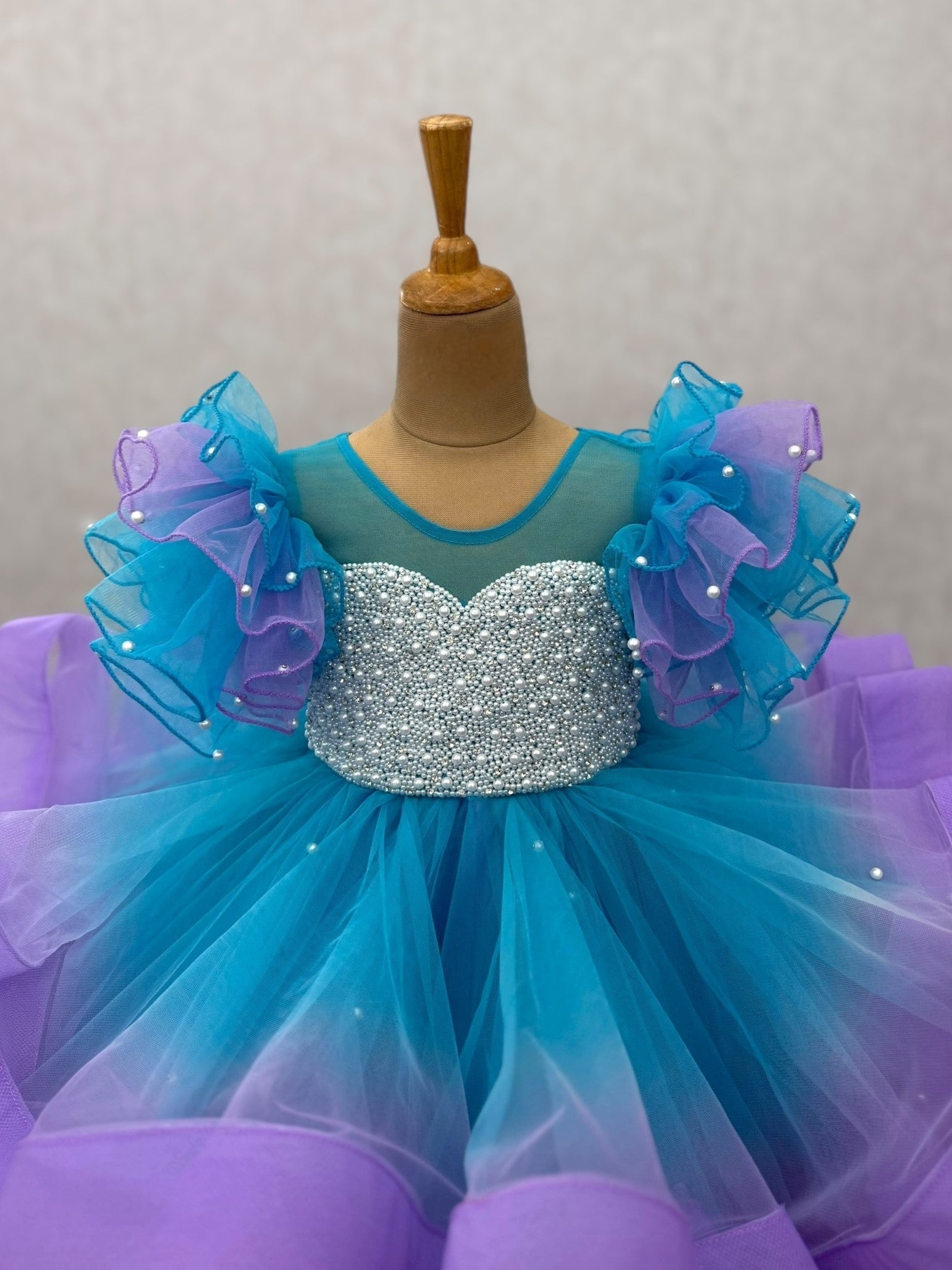 Enchanted blue and lavender – Fairy ruffle Ball Gown With intricate pearl work