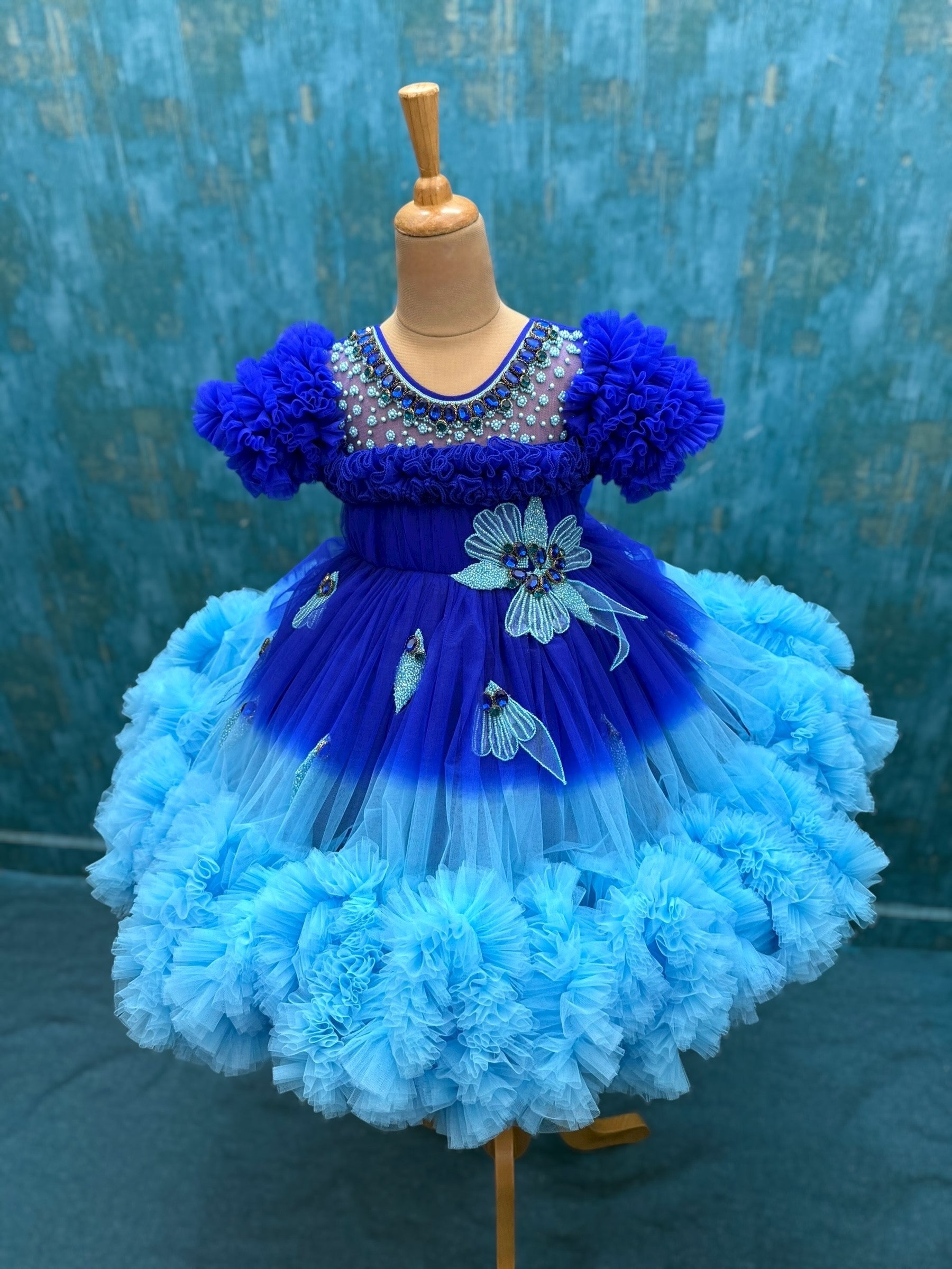 blue ombre shaded couture gown with hand crafted flowers