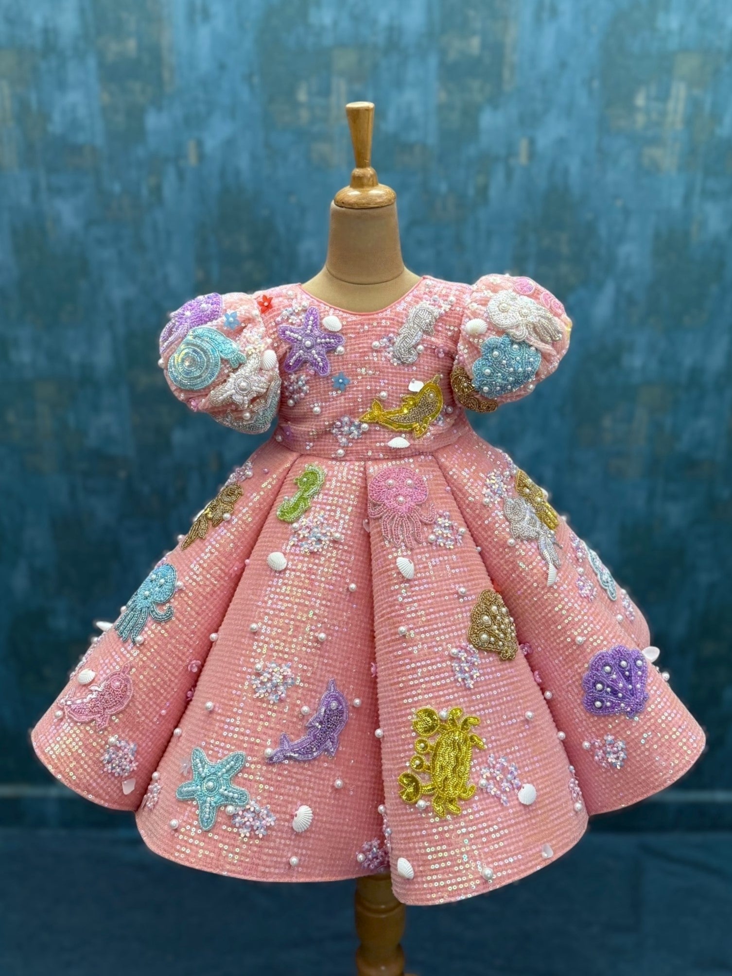 coral ocean theme panel gown with intricate hand work