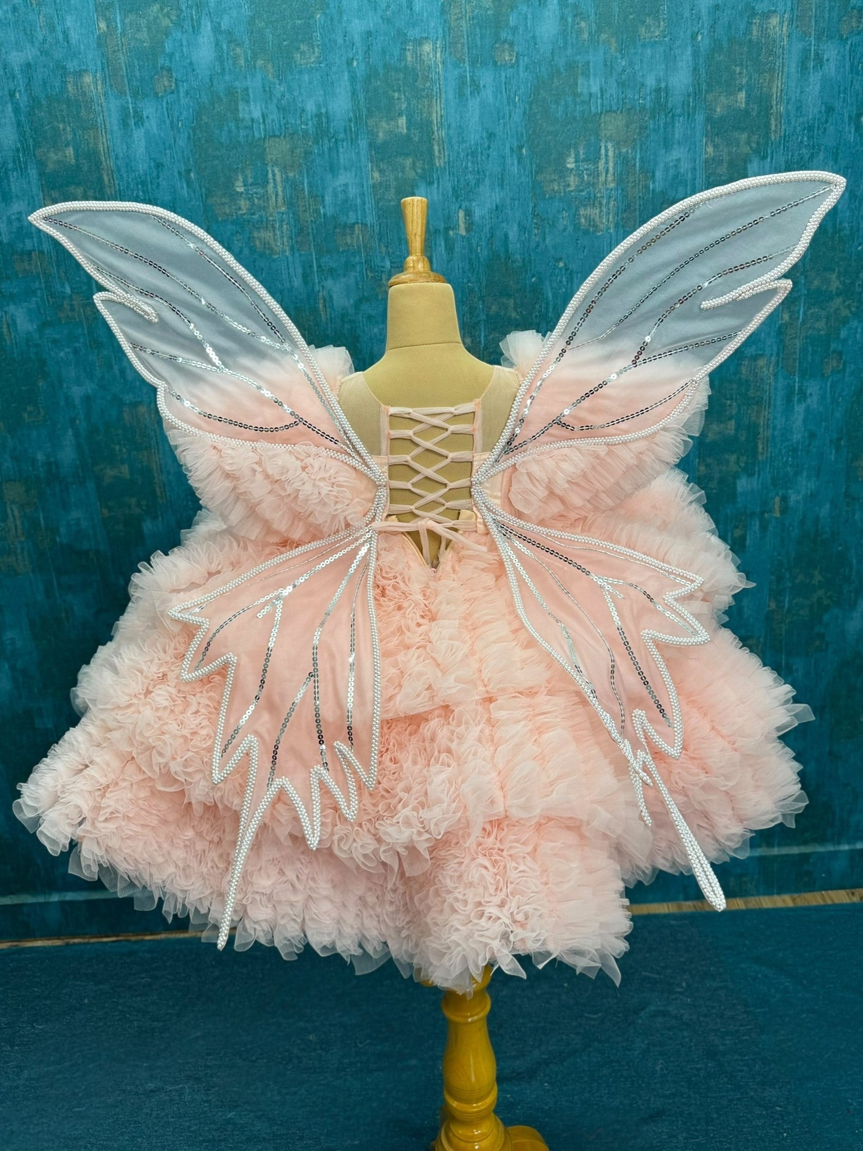 Peach Layer Ruffle Ball Gown With Hand Crafted Wings