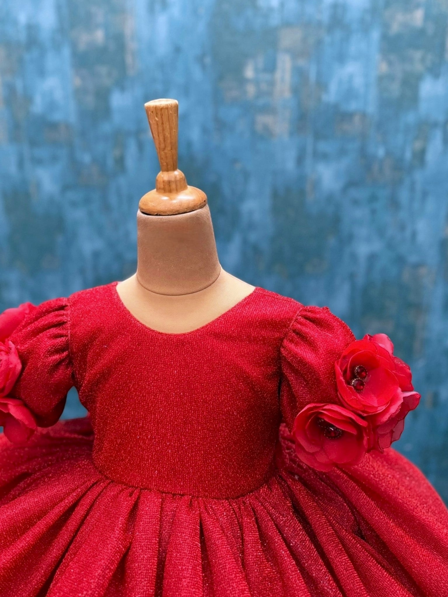 red shimmery floral gown with embossing flowers