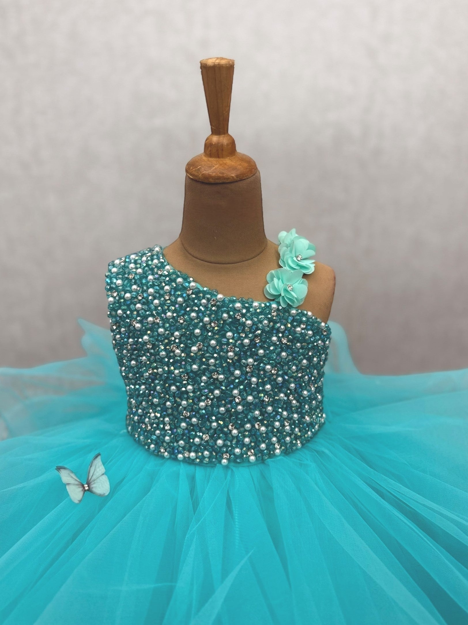 Seafoam Butterfly Bliss Couture gown with intricate work