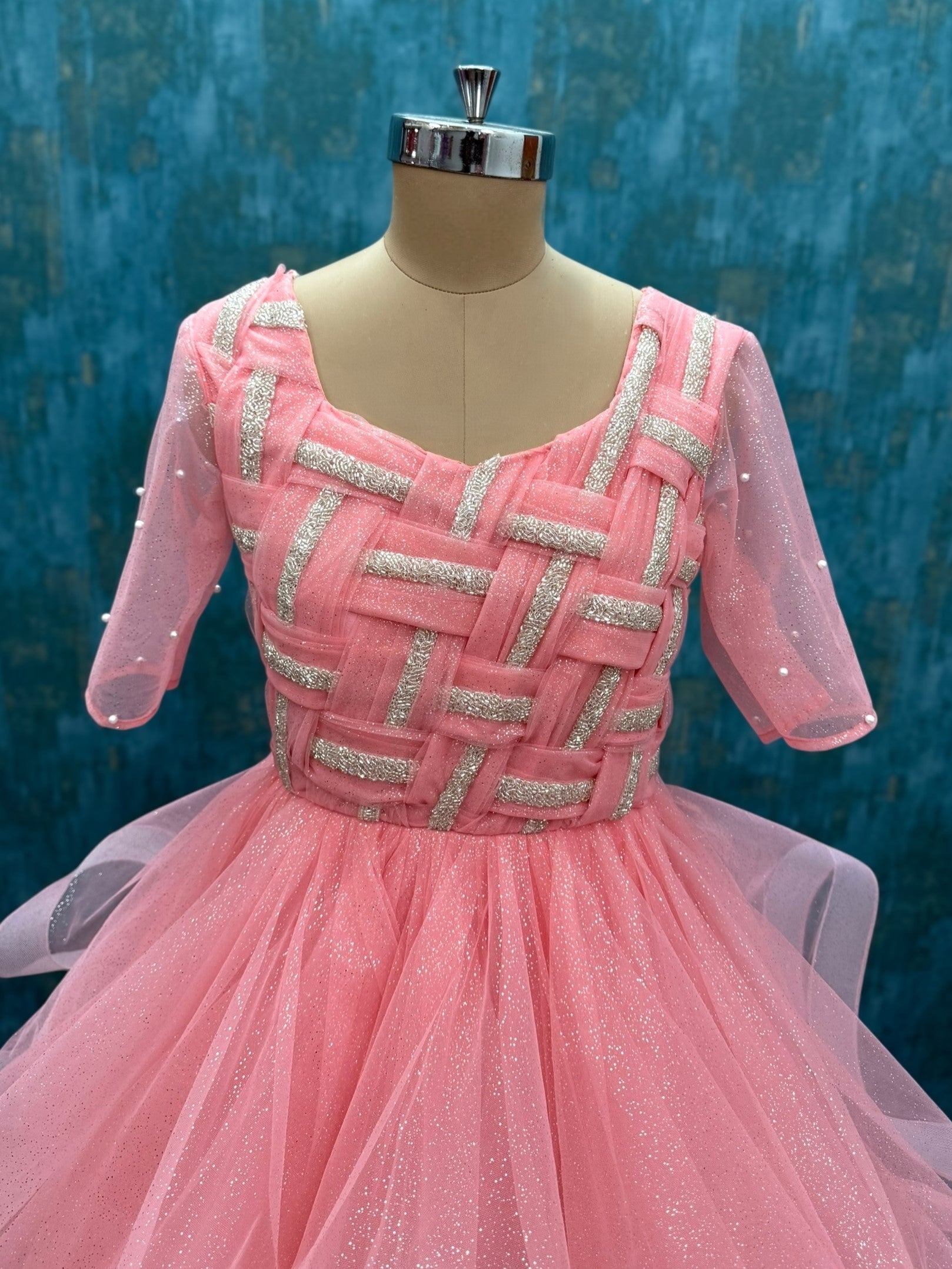 Peach Glitter Ruffle ball Gown with Draped Silver Hand neck