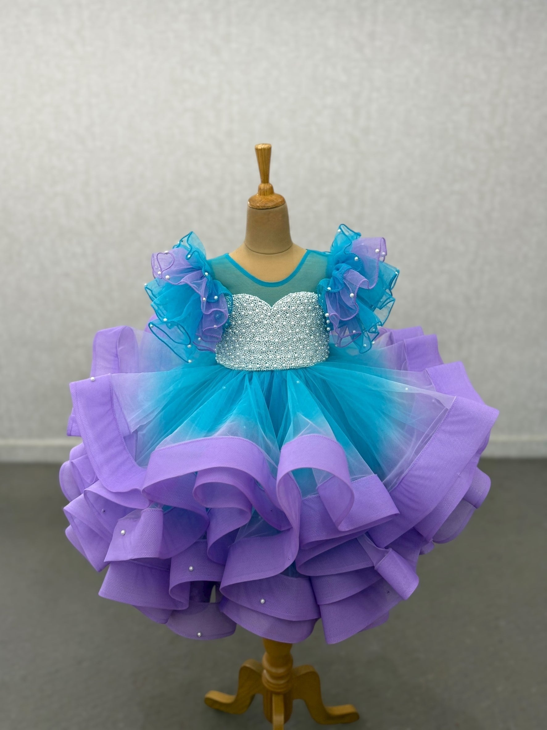 Enchanted blue and lavender – Fairy ruffle Ball Gown With intricate pearl work