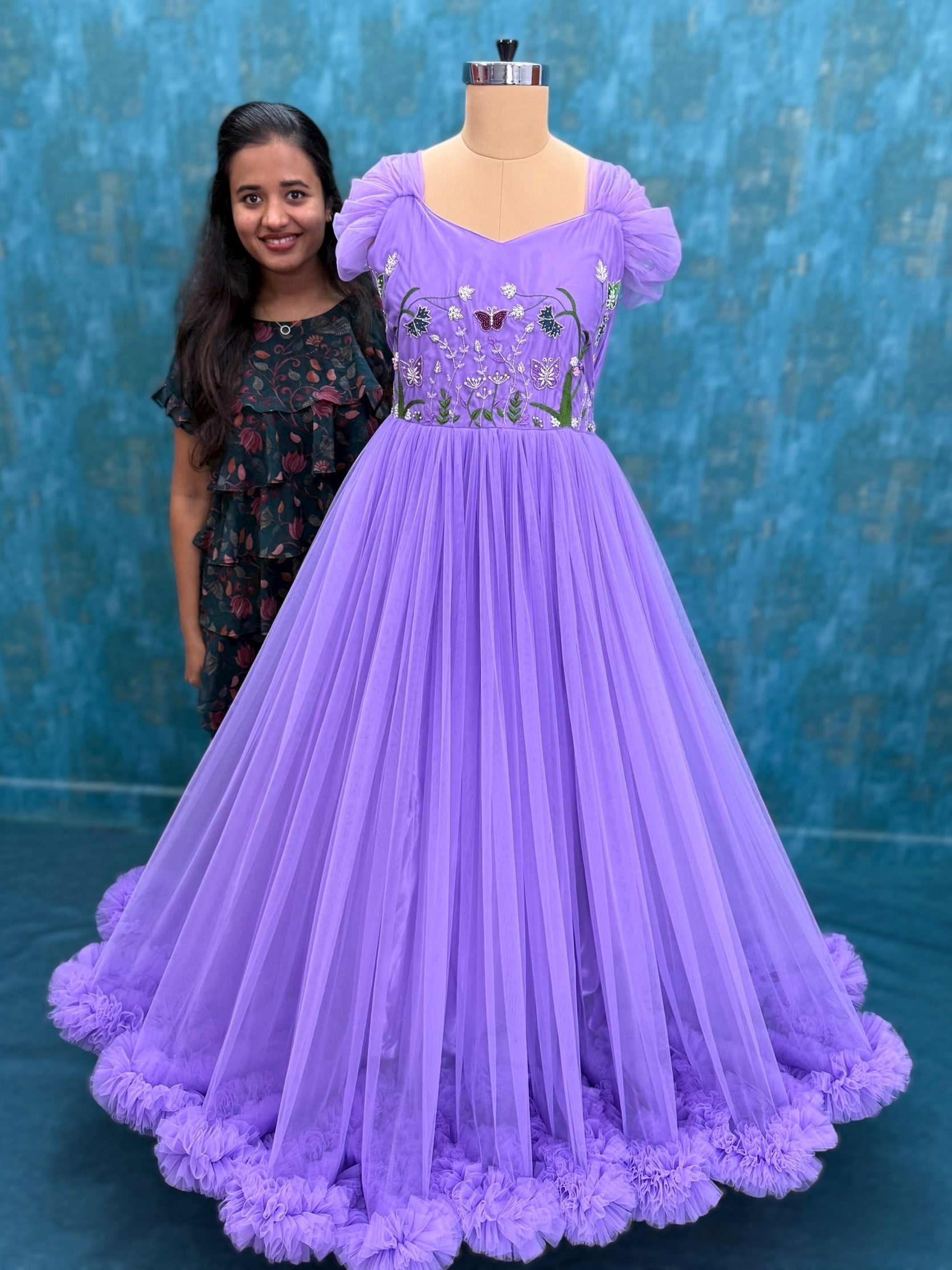 Floral and butterfly hand embroidered ruffle gown