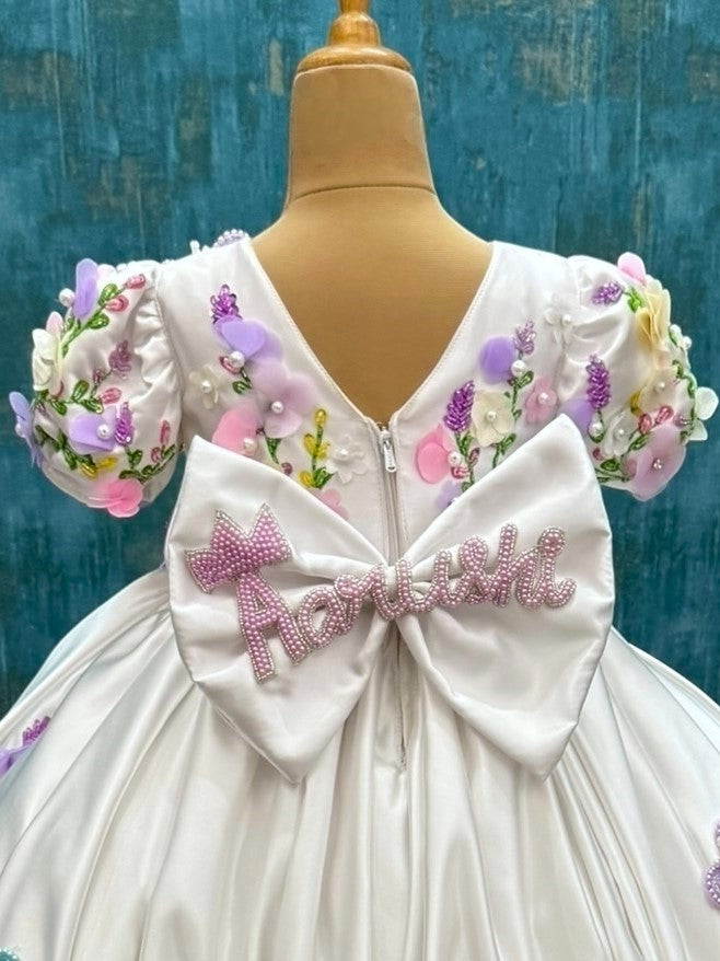 mind blowing white floral ball gown with attached trail with intricate hand work