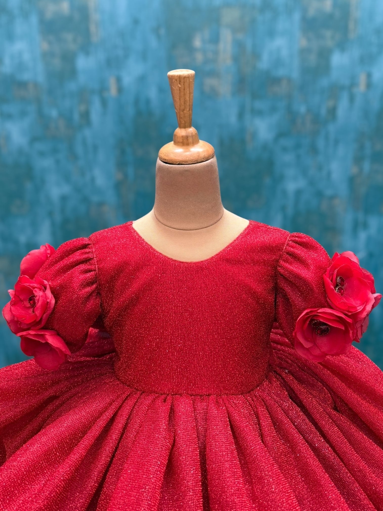 red shimmery floral gown with embossing flowers