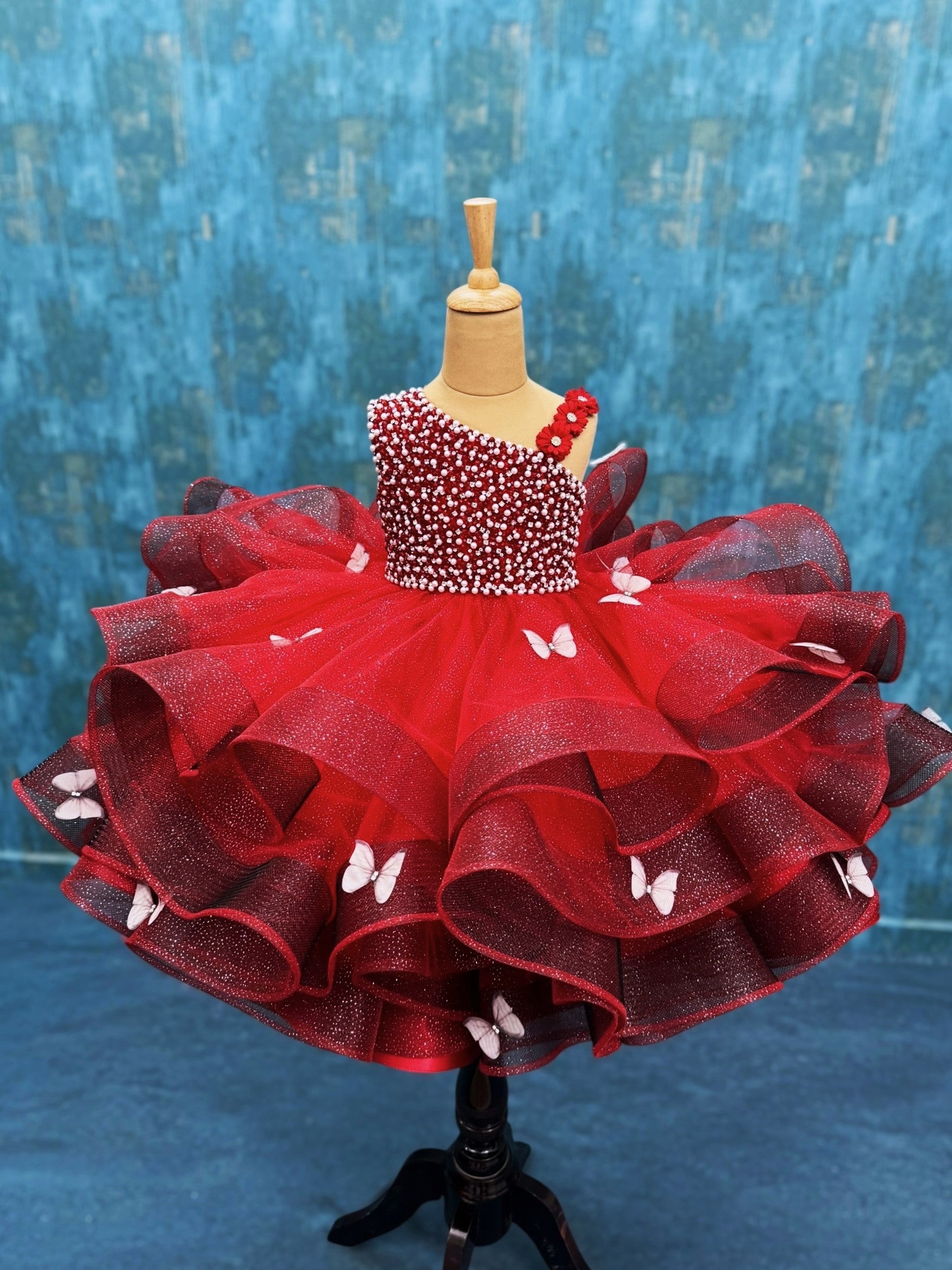 Red Butterfly Bliss Couture gown with intricate work