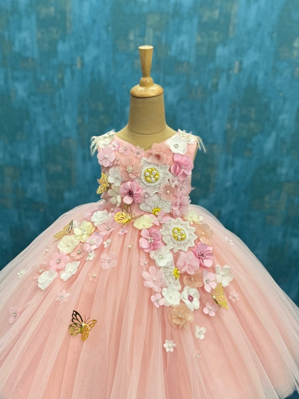 Soft Rose Pink floral and butterfly sleeveless ball gown with intricate work