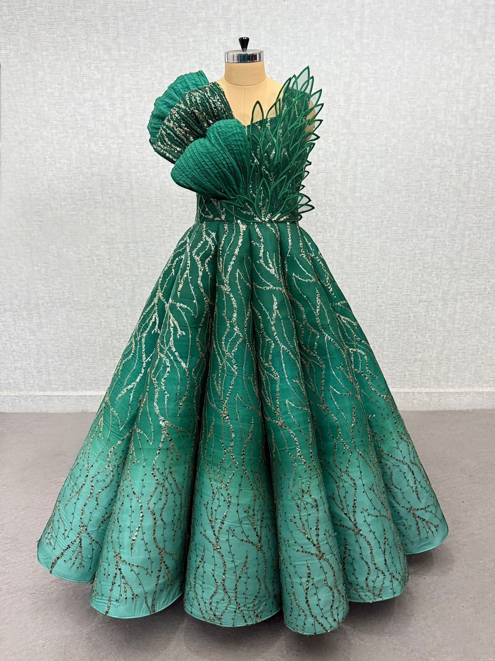 Green Structured Shaded Panel Ball Gown with Embossing Bows and Hand Embroidered Petals