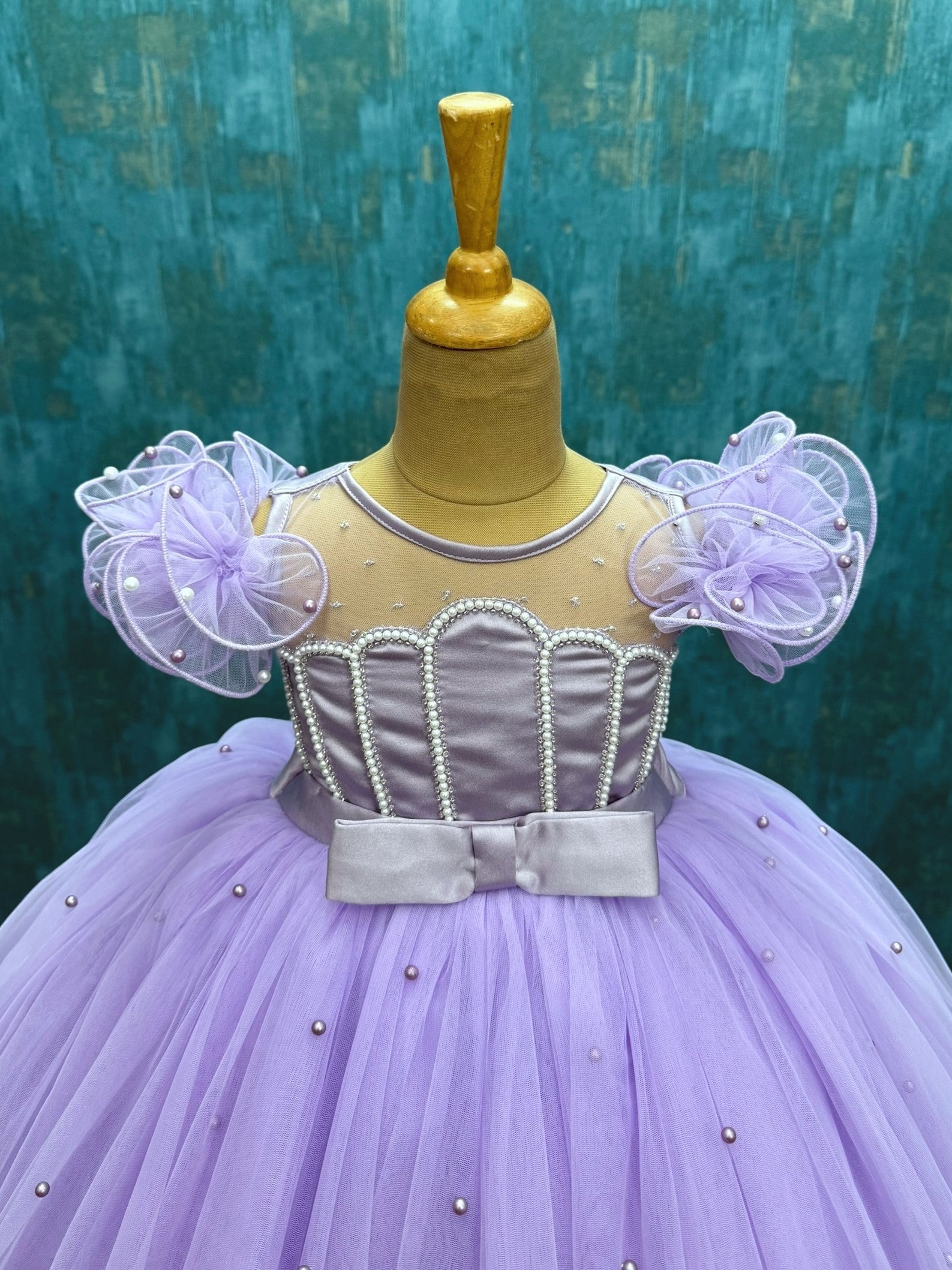 lavender tulle ball gown with shell shaped top