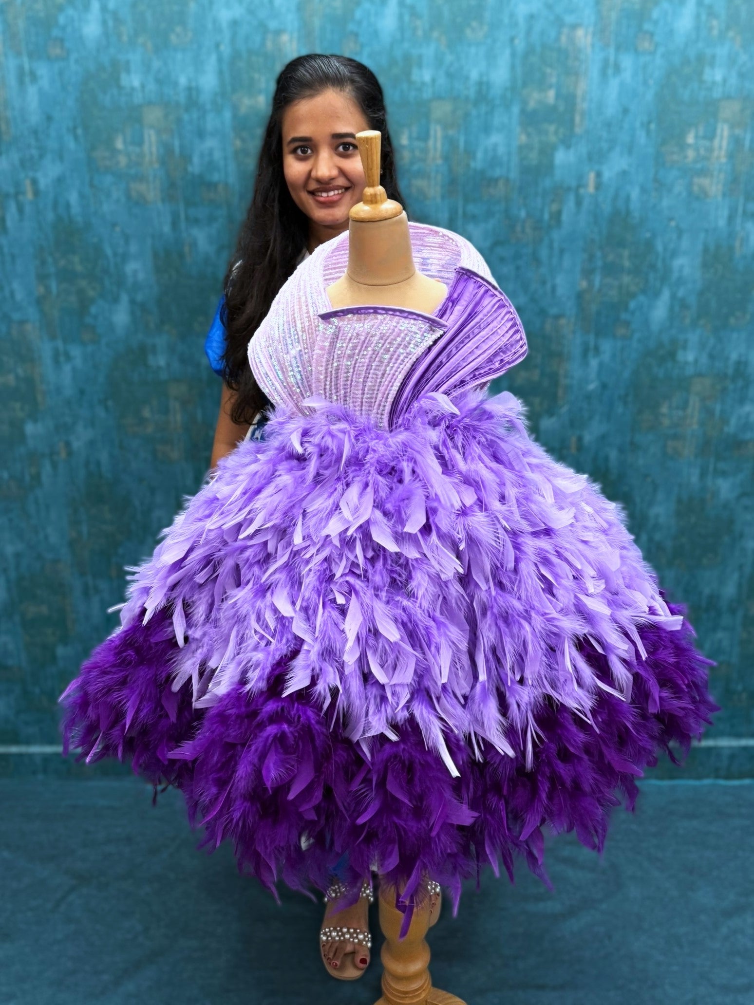lavender and purple feather ball gown with sequenced structure top
