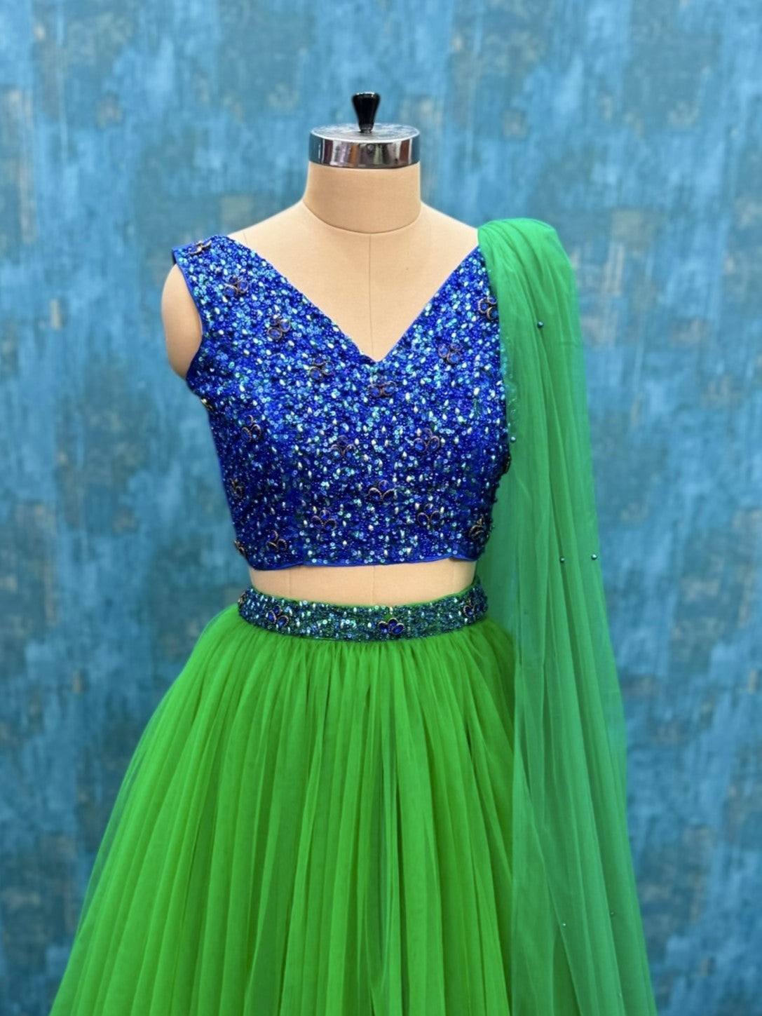 Peacock Crest Blue Crystal Majesty Emerald Flow Lehenga Ensemble With Dupatta
