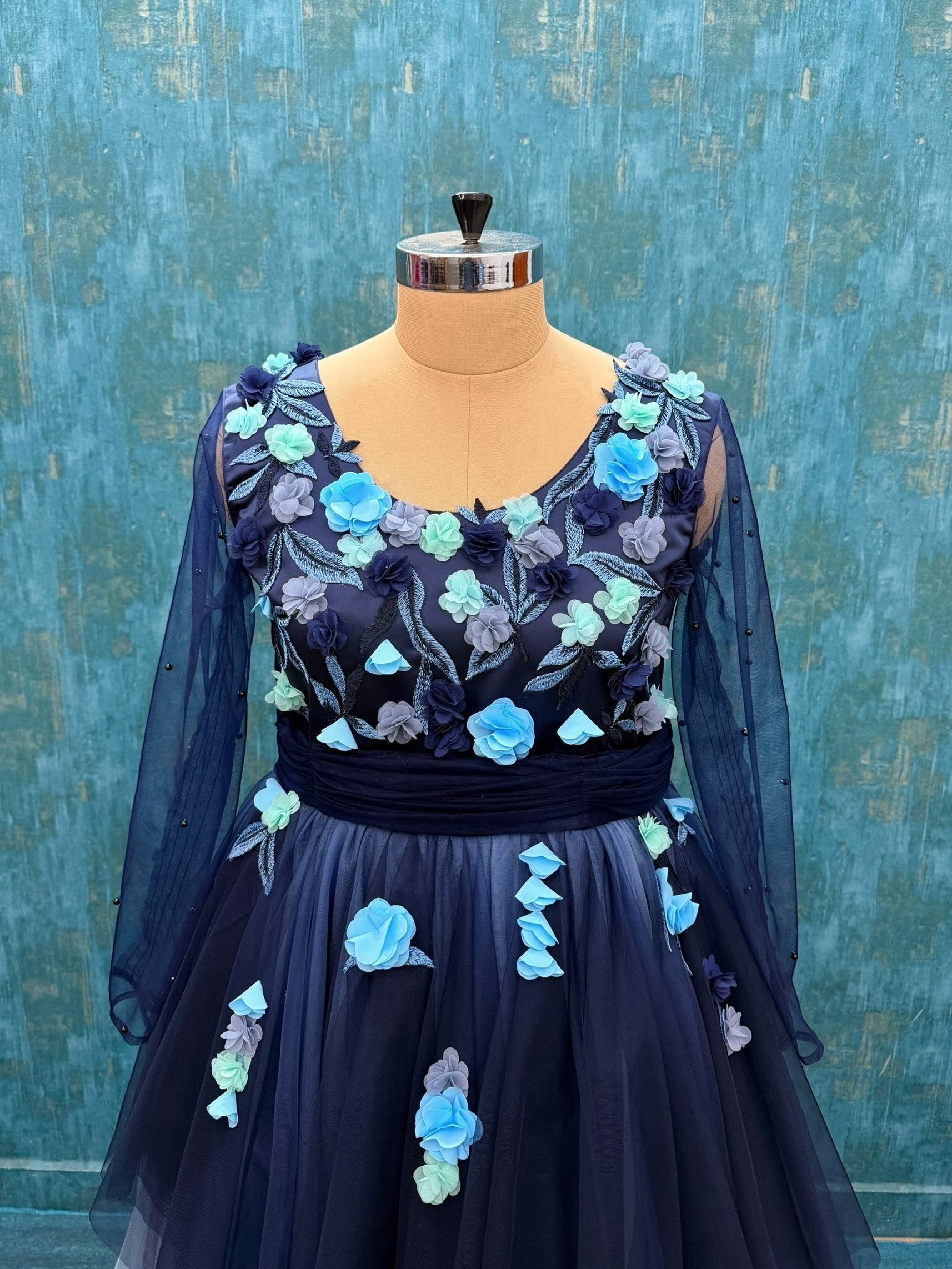 BLUE OMBRE FLORAL FLOUNCE GOWN WITH NETTED SLEEVES