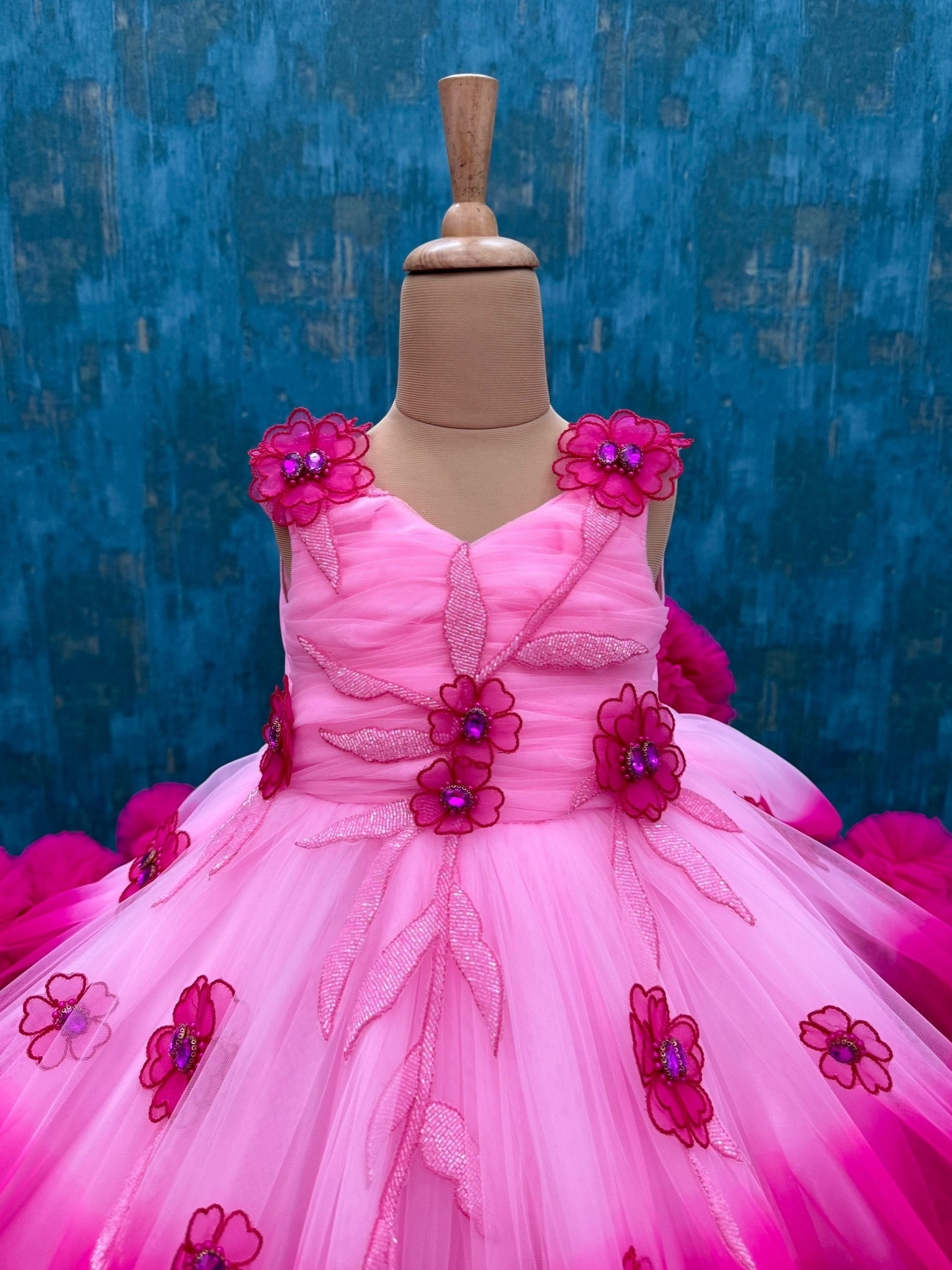 Baby pink and Fuchsia pink double shade couture gown with hand crafted flowers and leaves