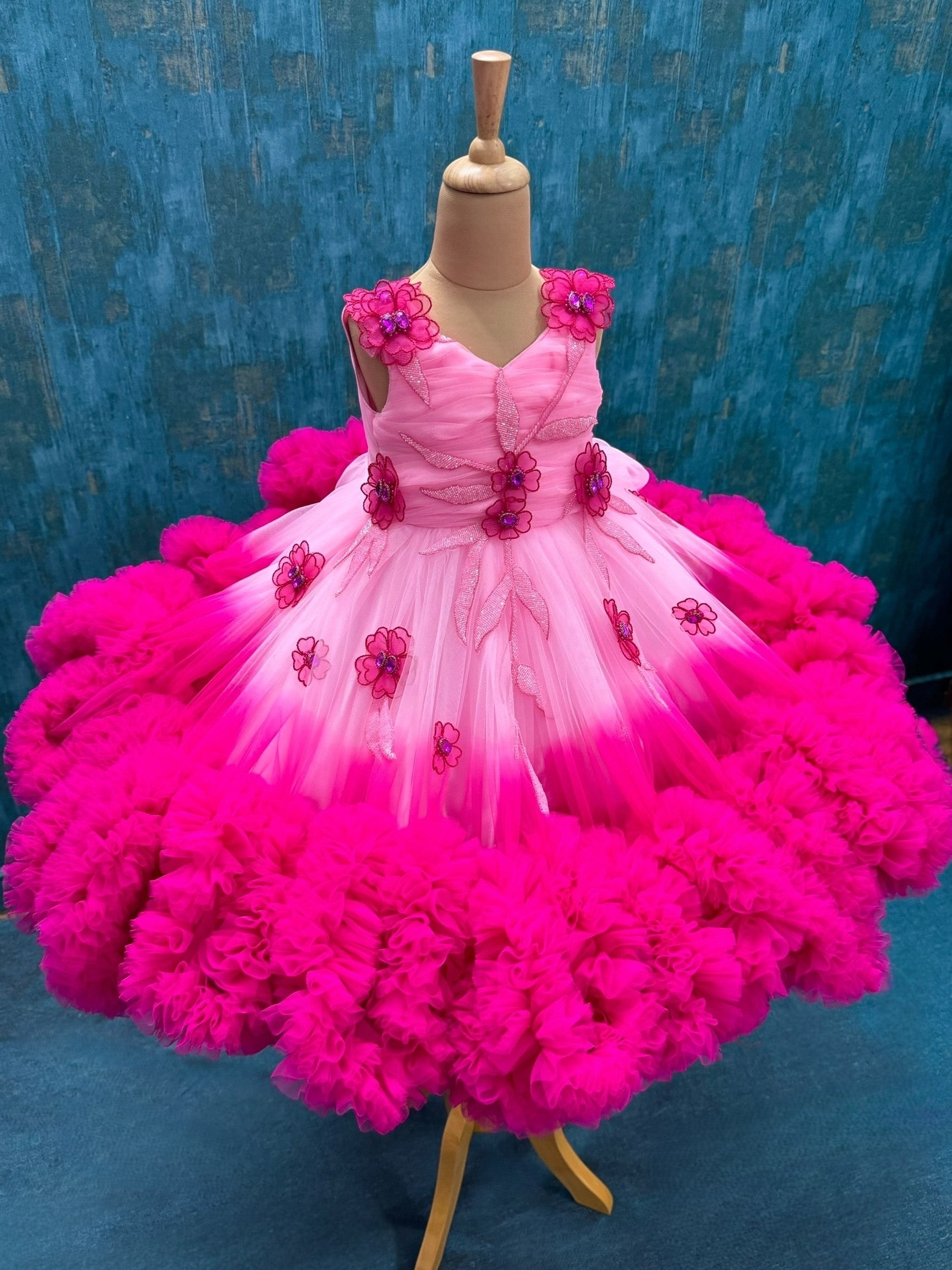 Baby pink and Fuchsia pink double shade couture gown with hand crafted flowers and leaves
